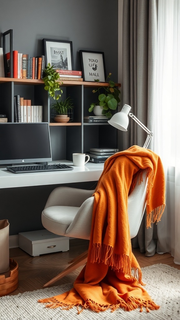 A cozy home office featuring a burnt orange decorative throw on a chair, with framed artwork and a desk lamp in the background.