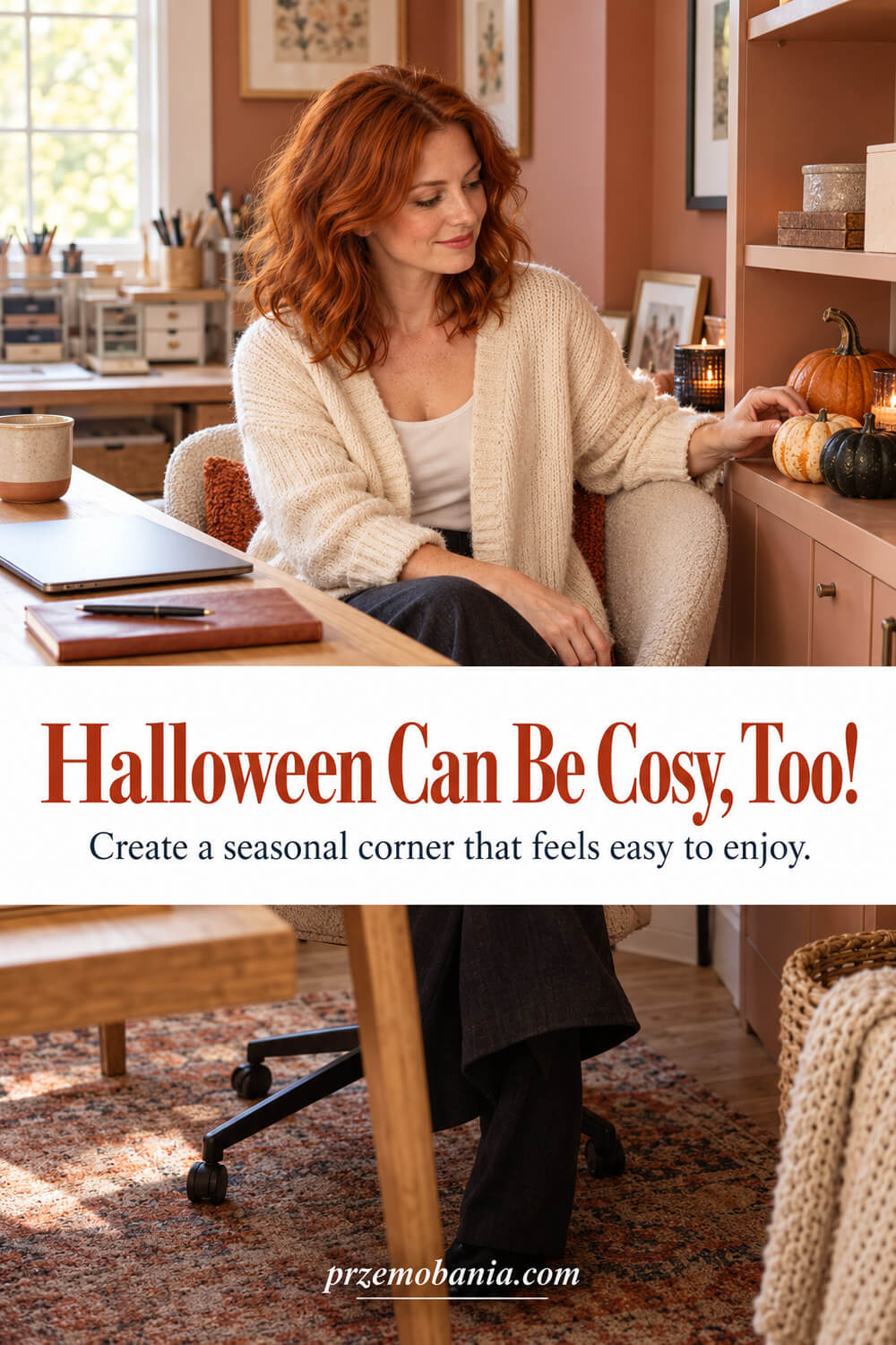 Red-haired woman in a cosy Halloween home office with a pumpkin display.